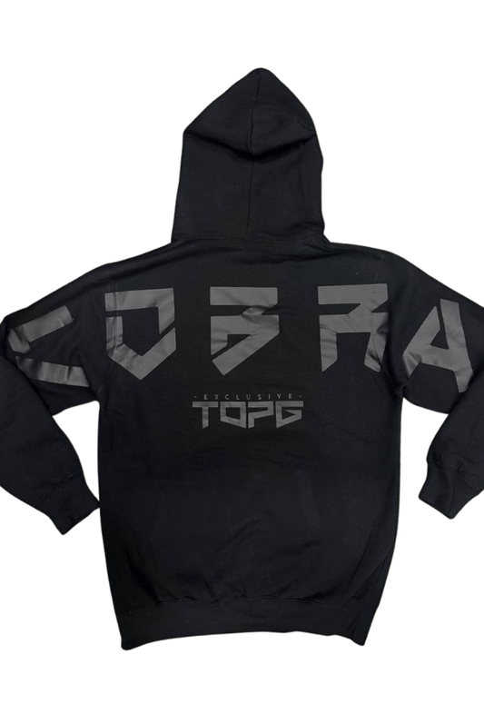 Cobra’s Shield Blackout Edition
Premium Black Hoodie.